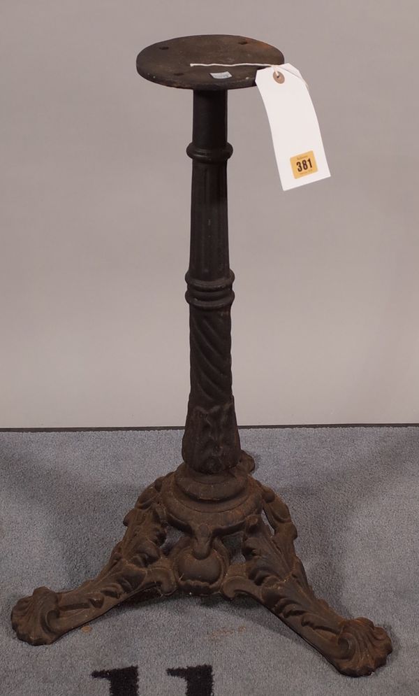 A late Victorian cast iron table base with acanthus outswept supports, 68cm high.  B3