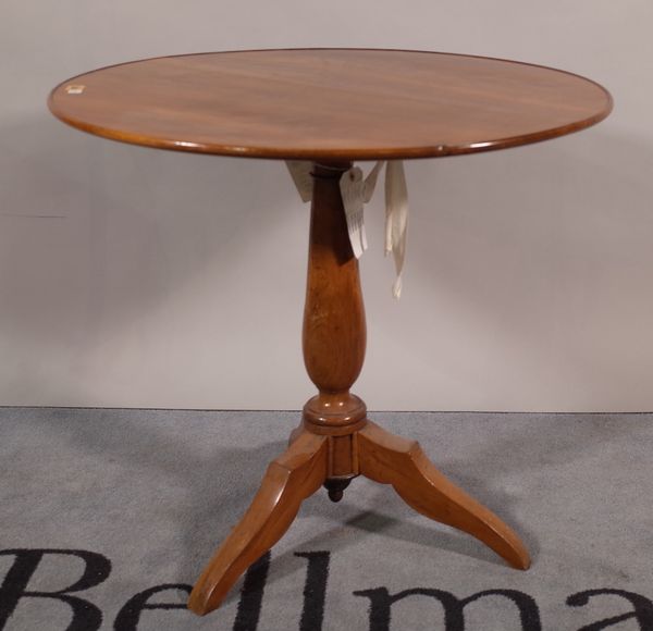 A 19th century walnut tripod table with dished circular top, on outswept supports, 72cm diameter x 66cm high.  A1