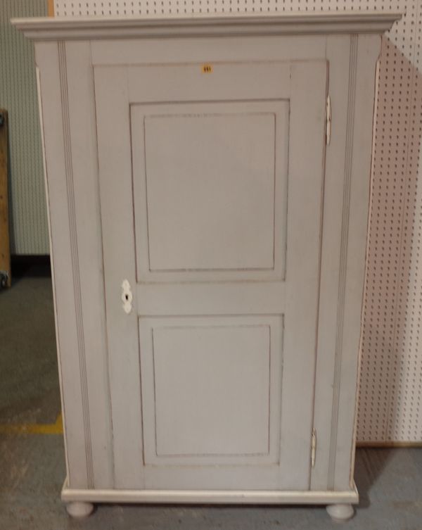 A late Victorian grey painted side cupboard with panelled doors, on bun feet, 105cm wide x 164cm high.  A2