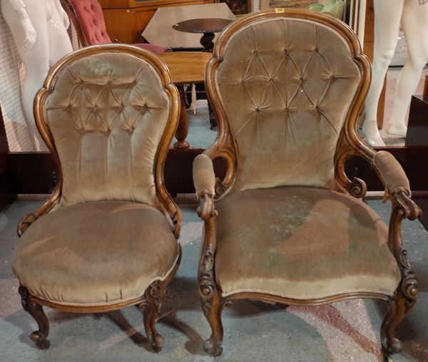 A Victorian walnut framed upholstered armchair and a matching lady's armchair, 67cm wide x 102cm high.  A1