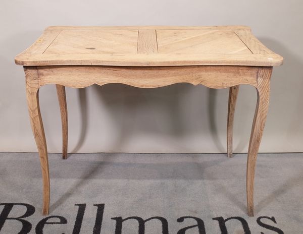 An early 20th century French oak and elm centre table, on tapering supports, 101cm wide x 73cm high.  E5