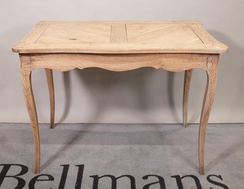 An early 20th century French oak and elm centre table, on tapering supports, 101cm wide x 73cm high.  E5