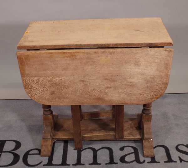 A late 19th century oak drop flap gate leg dining table, 76cm wide x 74cm high.   B2