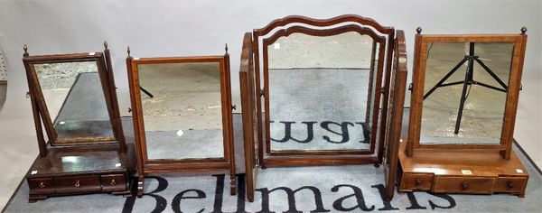 A George III mahogany breakfront toilet mirror, with three frieze drawers, on bracket feet, 44cm wide x 60cm high, another similar 38cm wide x 56cm hi