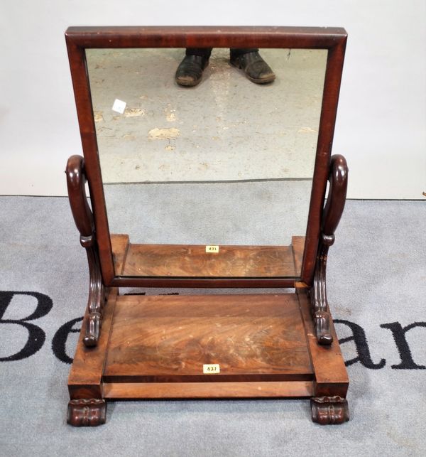 A Regency mahogany breakfront swing frame toilet mirror, on scrolling supports, 54cm wide x 69cm high.  E2