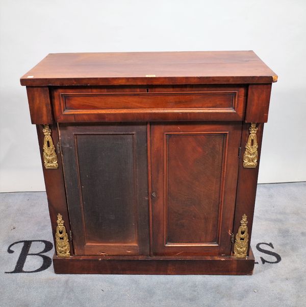 A 19th century gilt metal mounted side cabinet with a single drawer over a pair of drawers, 86cm wide x 89cm high.