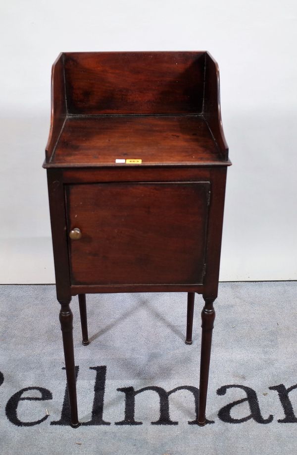 An early 19th century mahogany pot cupboard, the galleried top over single door, 39cm wide x 92cm high.  D4