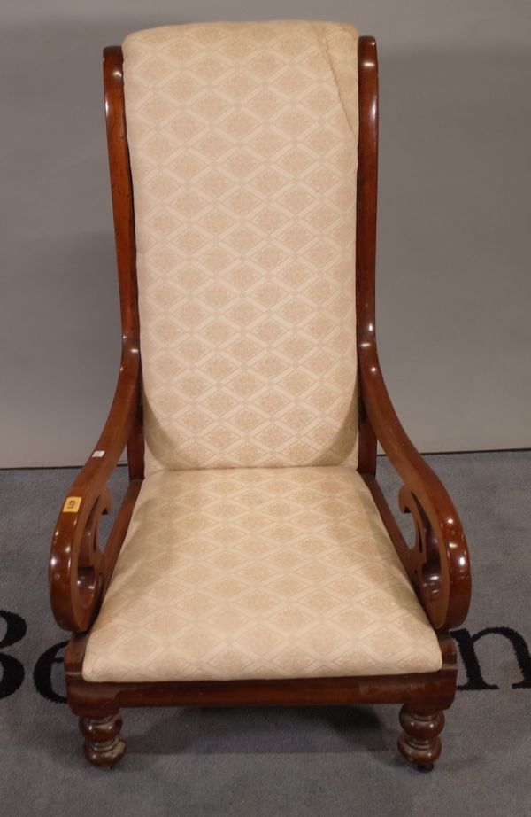 A 19th century mahogany framed scroll armchair on turned supports, 60cm wide x 105cm high.  E3