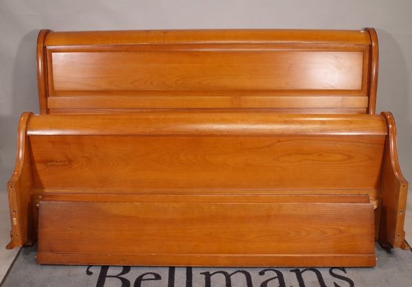 A 20th century cherrywood superking sleigh bed, 192cm wide x 109cm high.  C1