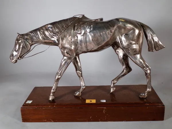An early 20th century silver plated model of a horse on a oak rectangular plinth base, 46cm wide x 36cm high.  B3