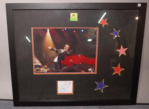 ELTON JOHN  'THE RED PIANO' CAESARS PALACE, LAS VEGAS, 2004 - 2009:  a colour print of the singer with his Yamaha red grand piano, the image 18cm x 19