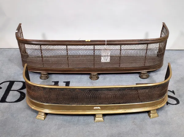 Two early 20th century brass and metal mesh fire fenders, 140cm wide x 32cm high and 94cm wide x 24cm high, (2).  C1