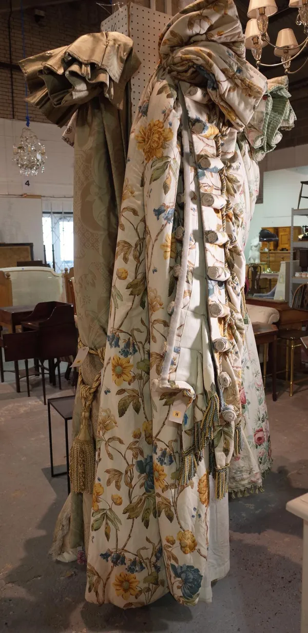 Curtains; a pair of white ground lined and interlined curtains with all over floral design, 130cm wide x 252cm drop and matching pelmet.   C3
