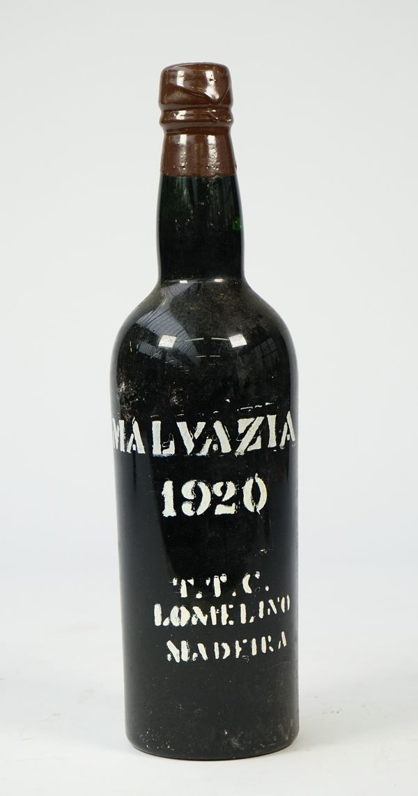 One bottle 1920 Malvazia the bottle detailed 'T.T.C. Lomelino Madeira'.