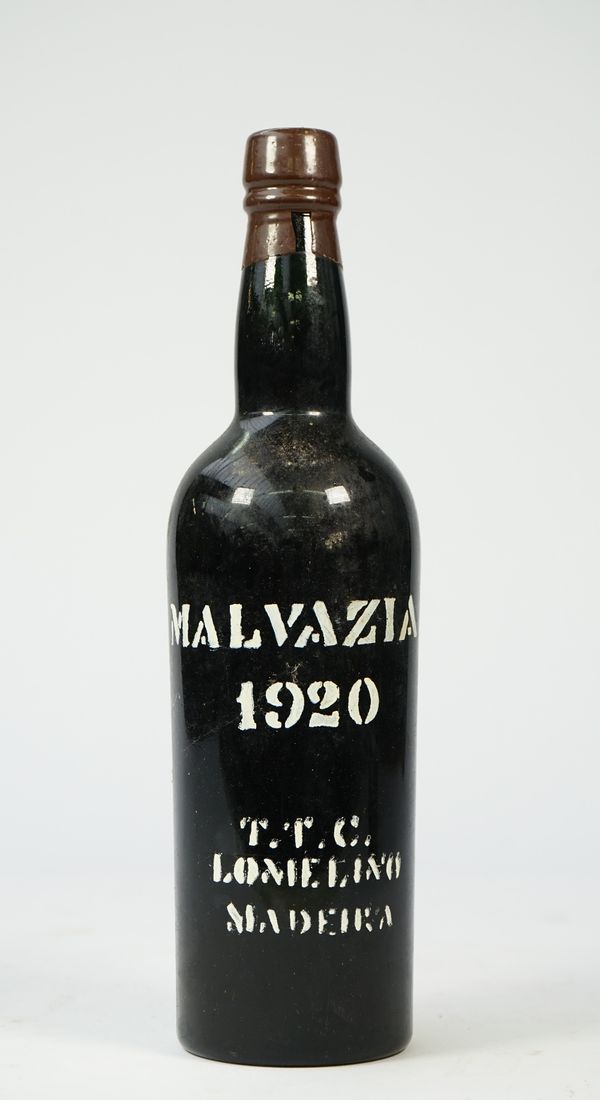 One bottle 1920 Malvazia the bottle detailed 'T.T.C. Lomelino Madeira'.