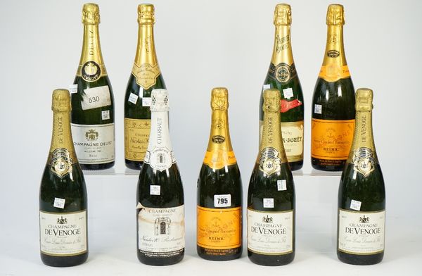 Nine bottles of mixed champagne, comprising; two Veuve Clicquot Ponsardin, 1985 Champagne Deutz, Charbaut 'Number 10 Restaurant', Nihcolas Feuillatte,