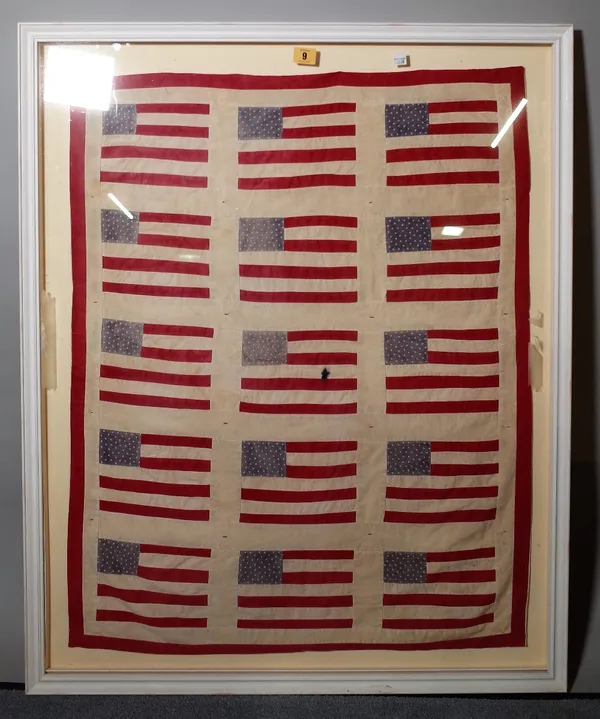 A textile panel 'American flag', framed and glazed, 94 cm x 76 cm overall. A1