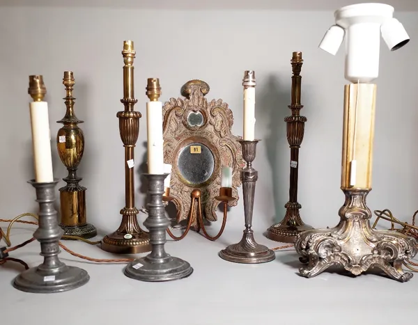 A group of seven assorted decorative table lamps including silver plated and pewter examples and a faux wood girandole wall mirror, 42cm high. S1B
