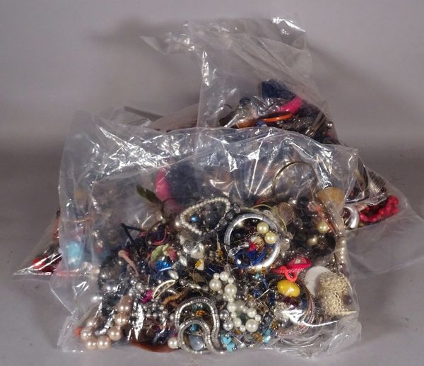 Costume jewellery; a large quantity of 20th century costume jewellery, including bangles, necklaces and rings, (qty).  S5T