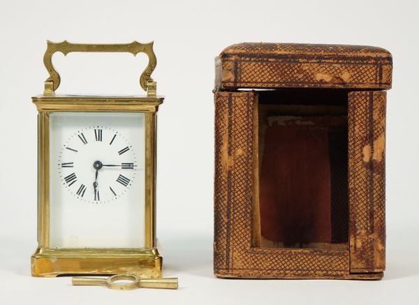 A brass cased carriage clock, 20th century, with visible platform escapement, plain enamelled dial and a single train movement, cased, 11cm high, (key