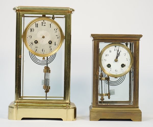 A French gilt brass cased four glass mantel clock, early 20th century, with Mercury filled pendulum, 29.5cm high and a smaller similar clock by John W