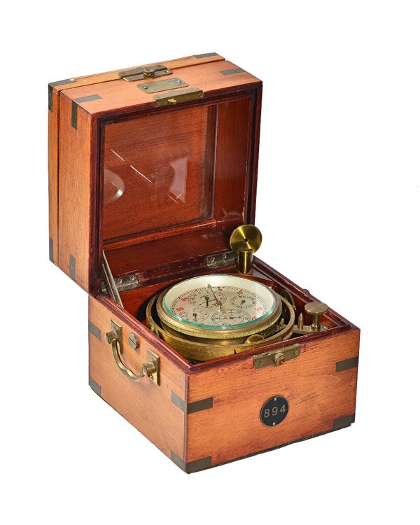 A Russian gilt brass cased chronometer, mid 20th century, gimble mount in a mahgoany case, with bill of purchase, dial 11cm diameter. Illustrated.