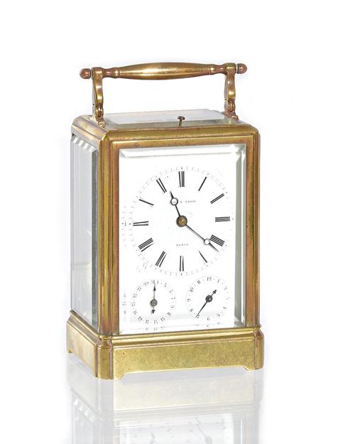 A brass cased carriage clock detailed 'JOHN B. CROSS, PARIS', late 19th century, push repeat, four glass case with subsidiary date and alarm dials, tw