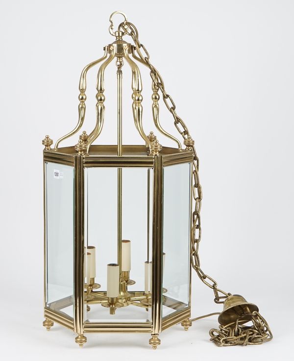 A Regency style gilt metal hall lantern of hexagonal form with internal six light fitment, 80cm high.