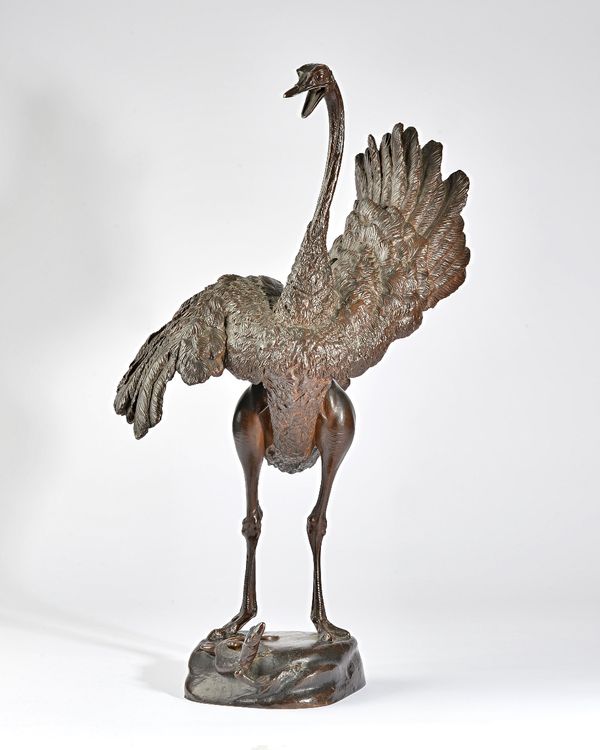 Julius Heinrich Haehnel (German 1823-1909), patinated bronze of an Ostrich with a lizard on a naturalistic base, signed J Haehnel, 57.5cm high.Ex Chri