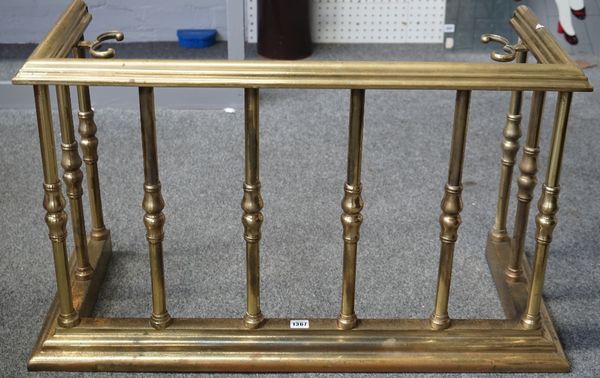 A Victorian gilt brass fire fender, with stepped top and kerb, united by turned pillars andwith internal tool supports, 91cm wide x 53cm high x 38cm d