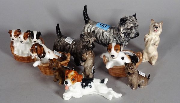 Royal Doulton; a group of ten various dog finials, the largest 11cm high.  CAB