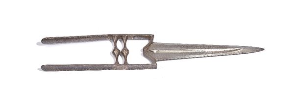 An Indian Katar, probably 17th century, with double edged steel blade, 23cm and foliate engraving to the handle, 41.5cm overall. Illustrated.