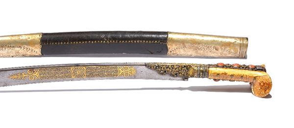 An Ottoman sword (Yataghan), dated AH 1224/1809-10AD, with curved steel blade, 57cm, gilt inlaid with Turkish verse and floral motifs, the ivory handl