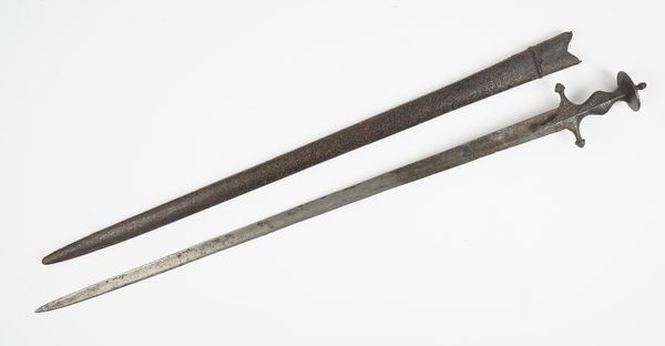 An Indian sword, 18th century, with single edged steel blade, 72cm, foliate engraved handle and a leather bound wooden scabbard, sword 82cm long overa