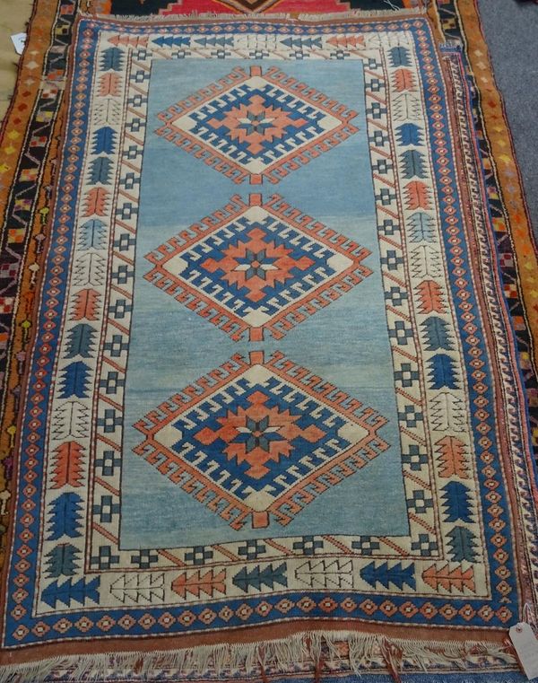 A Turkish rug, blue field, 203cm x 124cm.  D1