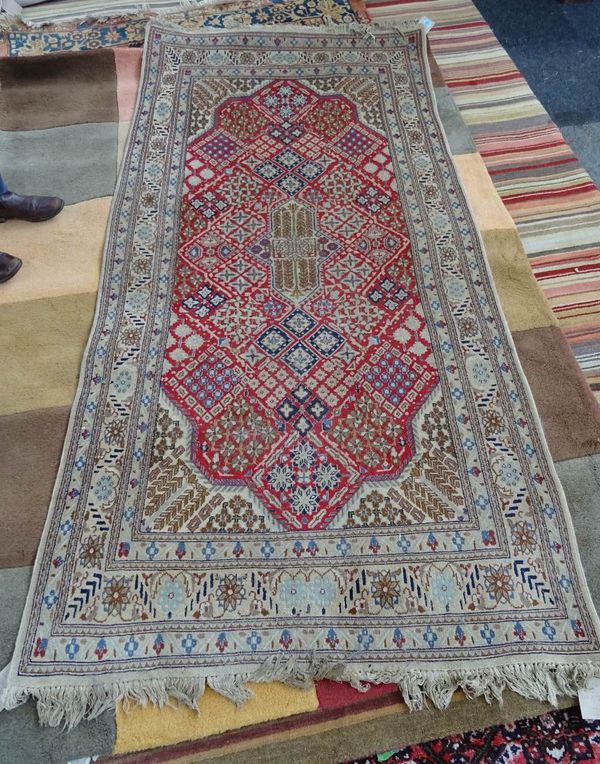 An Indian rug of Joshaghan design, 222cm x 119cm. D3