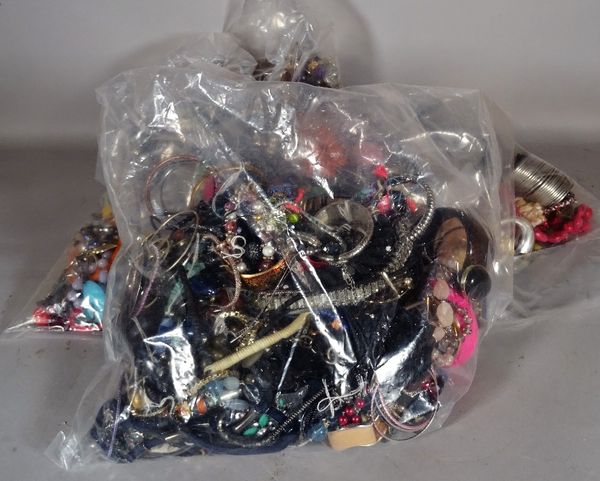 Costume jewellery; a large quantity of 20th century costume jewellery, including bangles, necklaces and rings, (qty).  S5B