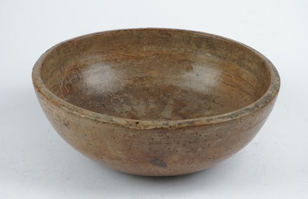 A 19th century turned sycamore bowl, 35cm diameter x 12cm high.