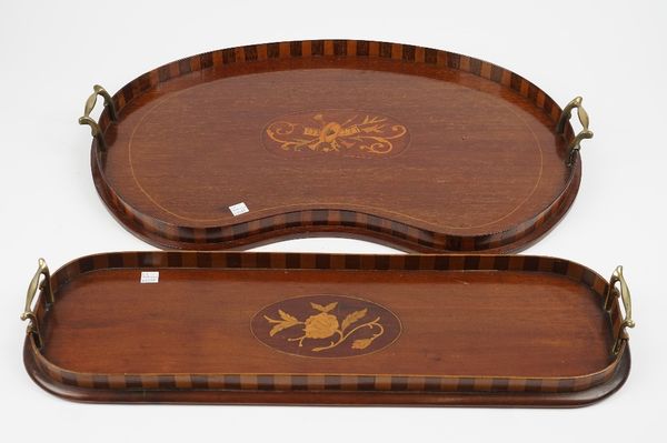 An Edwardian marquetry inlaid mahogany galleried kidney shaped serving tray, 61cm wide, together with a similar rounded rectangular tray, 60cm wide, (