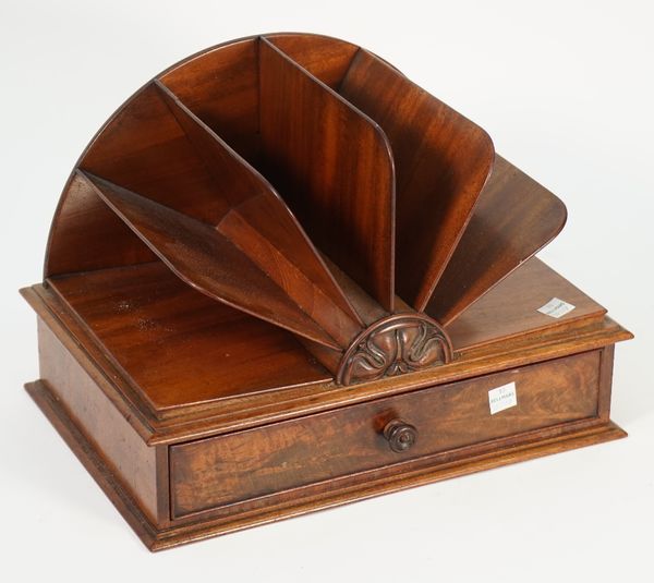 A 19th century mahogany desk tidy, the six division fan shaped top over single frieze drawer, 32cm wide x 22cm high.