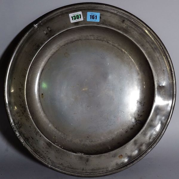 An English pewter charger, probably 17th century, touch marks to the rear, 42.5cm diameter. CAB