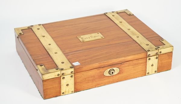 A brass bound hardwood rectangular jewellery box, with tray interior, 42cm wide x 8cm high.