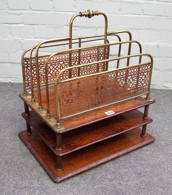 A late 19th century brass and oak four division two tier Canterbury, 49cm wide x 55cm high.