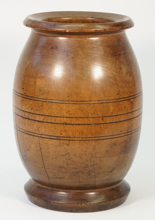 A large turned hardwood vase, with ribbed decoration, 39cm high.