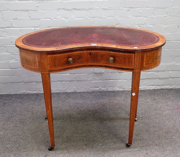 A small 19th century inlaid mahogany kidney shaped writing desk with single frieze drawer on tapering square supports, 98cm wide x 76cm high.