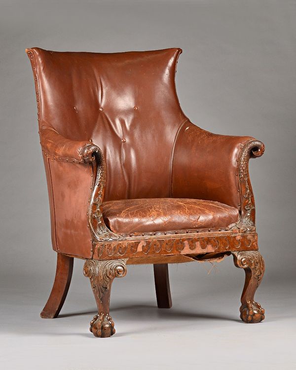 An 18th century style mahogany frame tub back bergere, with eagles head arm finial's and wave carved frieze, on ball and claw feet, circa 1880, 77cm w