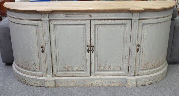 A French oak buffet, the stripped 'D' shape top over a painted four cupboard base, 196cm wide x 86cm high.