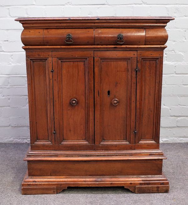 A 19th century Italian walnut side cabinet, with a pair of drawers over cupboard, on plinth base, 72cm wide x 87cm high.