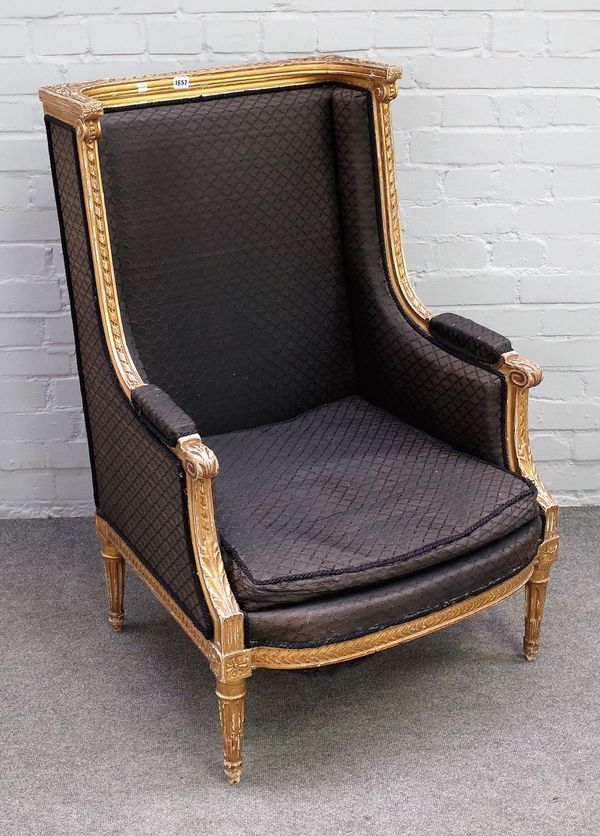 A Louis XVI style gilt framed square back armchair with bow seat on fluted supports, 71cm wide x 107cm high.