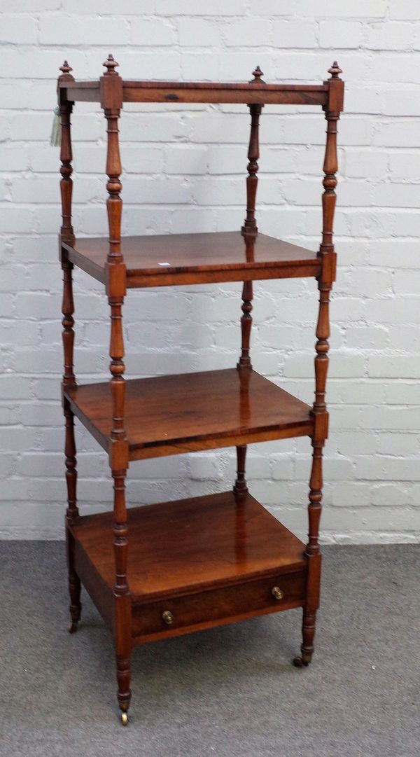 A Victorian rosewood four tier what-not with single drawer base on turned supports, 47cm wide x 134cm high.